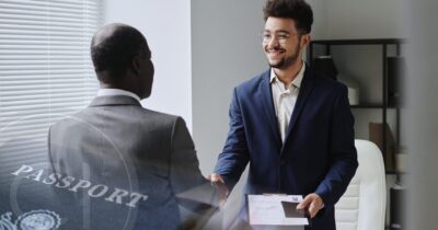 A professional hands a passport to a stateless individual, highlighting how Citizenship by Investment programs provide legal identity and global access.