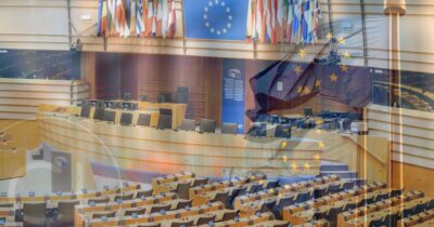 European Parliament chamber with EU flag overlay, symbolizing visa suspension reform discussions